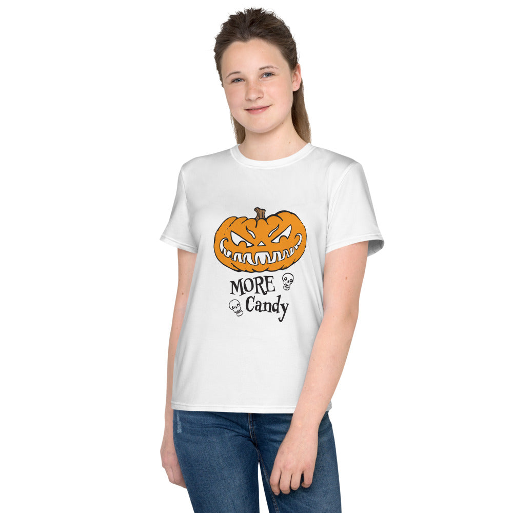 Teen - Tween girl wearing a white tshirt with the More Candy hungry pumpkin design